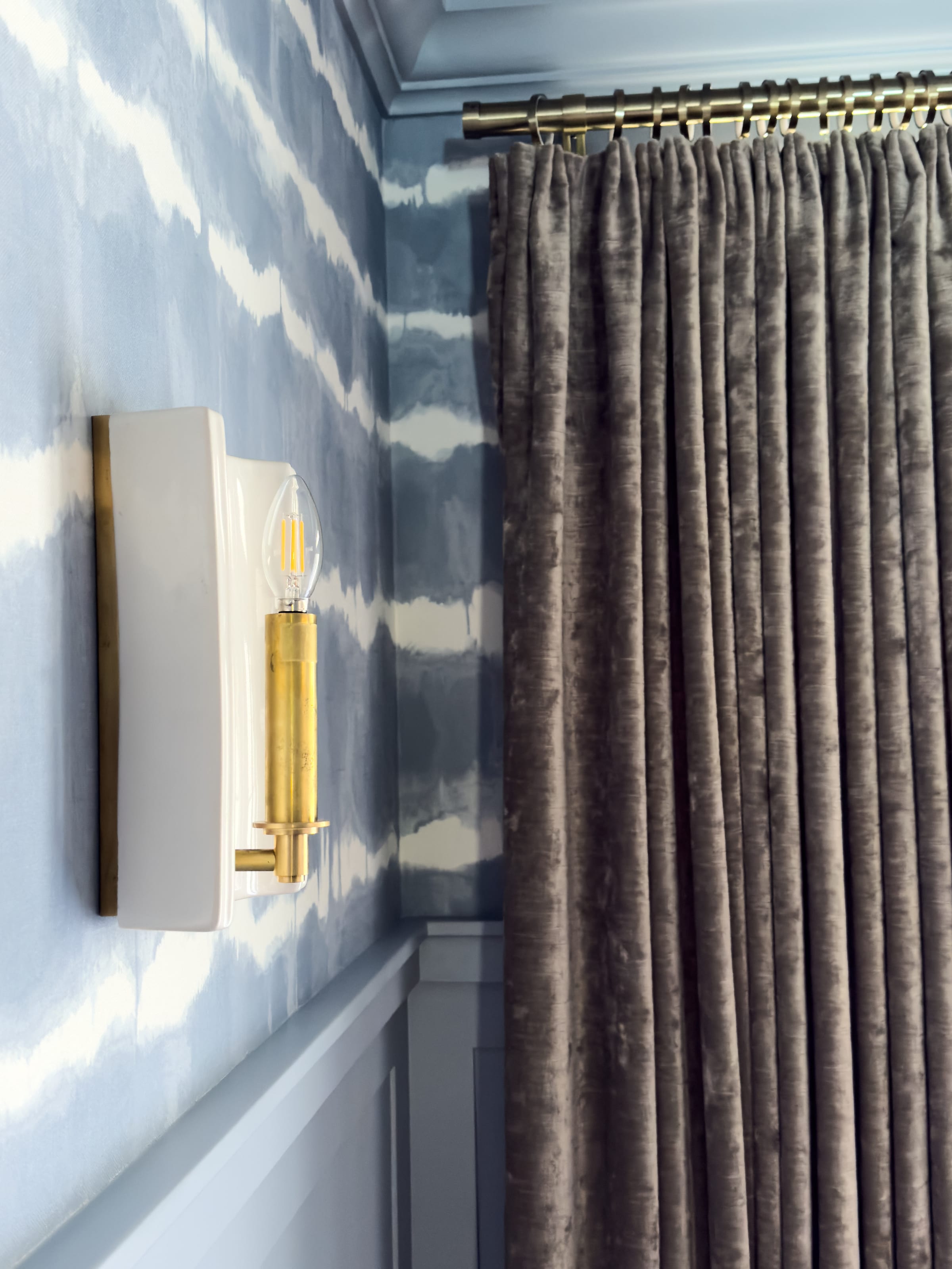 Wallpaper and tailored window-treatment detail in a luxury New Jersey dining room.