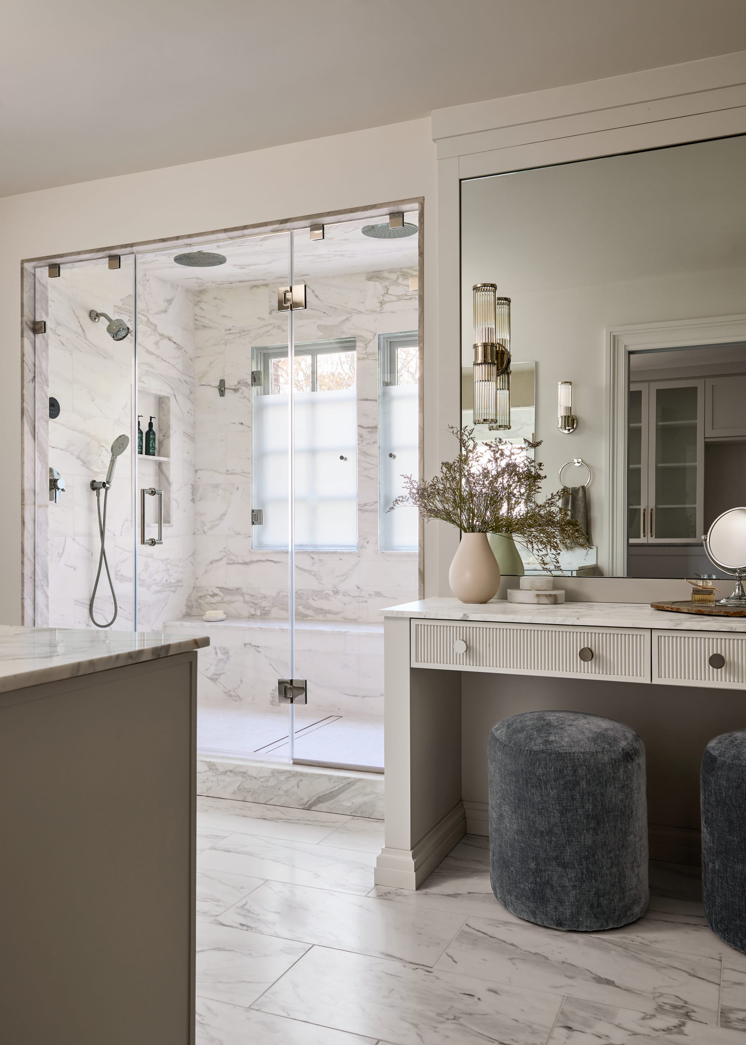 Luxury marble primary bathroom and vanity in a Summit, New Jersey whole-home renovation by Ellie Mroz Design.
