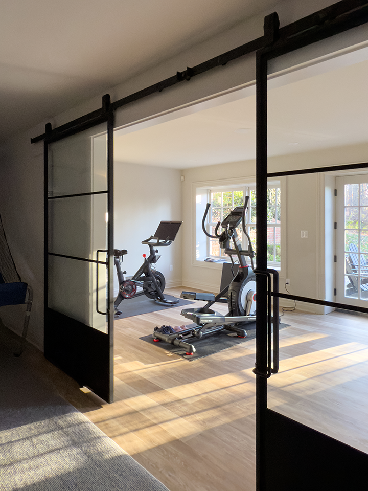 Metal and glass doors to home gym in Summit NJ renovation